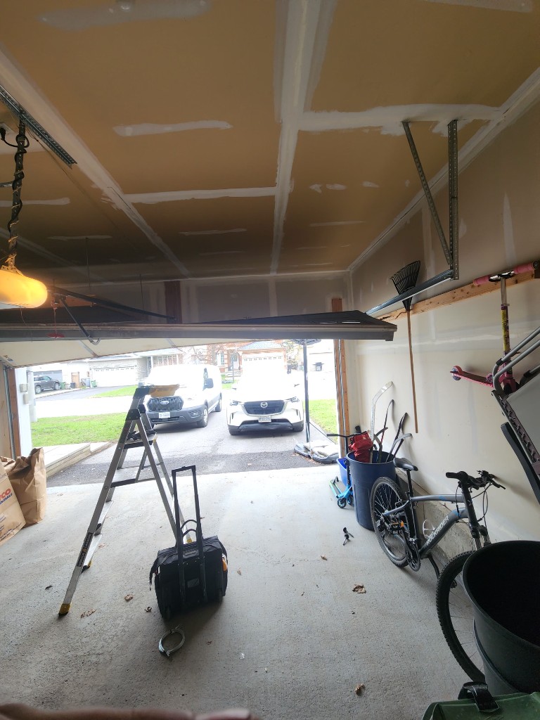 Stuck residential garage door needing emergency repair — Ottawa same-day service